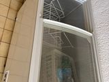 a refrigerator that has a glass door on top of it