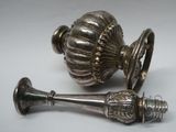 pair of antique silver plated door knobs on a white background