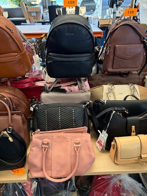 a lot of bags that are on a table