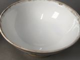 a white bowl sitting on top of a table