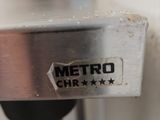 a close up of a metal object on a stand