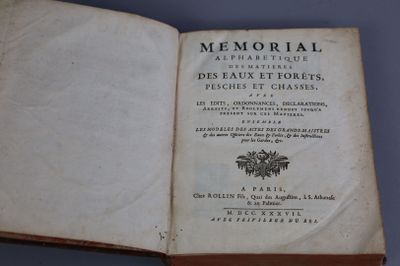 an open book with a picture of a bird on it