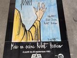 a poster on the ground with a drawing of a person ' s hand