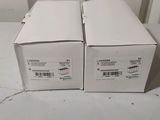 two boxes that are sitting next to each other on a table