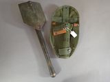 a shovel and a bag sitting on a table