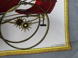 a picture of a red and gold carriage with a clock on it