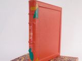 a book that is sitting on top of a book stand