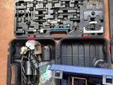 a tool box with tools in it sitting on a table