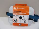 an orange and white bag on a white table