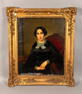 portrait of a woman in a black dress sitting in a red chair