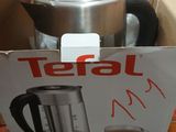 a box that has a tea maker inside of it