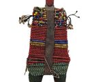 a close up of a small beaded bag on a white background