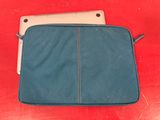 an open laptop case sitting on top of a red table