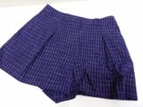 purple and white checkered skirt on a white surface