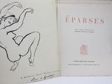 un livre ouvert sur lequel figure le dessin d'une femme nue
