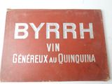 an old red sign with the words byrrh written on it