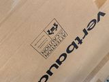 a box that is sitting on top of a carton