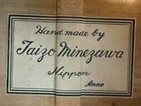 a sign on the side of a box that says taco minegara