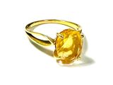 an image of a gold ring with a citrine stone in it