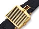 an image of a black leather belt with a gold buckle
