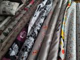 a lot of different types of fabric on the table