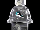 a lego man with a skateboard on a black background