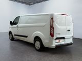 a white van that is parked in a large room