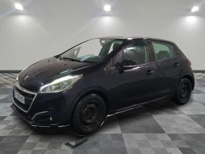 a picture of a black car parked in a garage