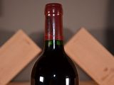 a bottle of wine that is sitting on a table