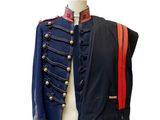 an image of a military jacket on a mannequin stand
