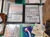 many different types of stamps on the table