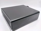an image of a black computer case sitting on top of a white surface