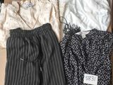 three pieces of clothing in a box on a table