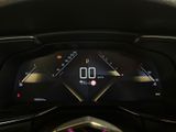 the dashboard of a car with a digital display on it