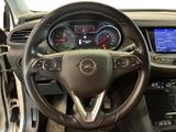 the interior of a car with a steering wheel, dashboard, and dash board