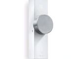 une image montrant un gros plan d'un interrupteur fixé au mur