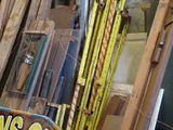several pieces of wood are stacked on top of each other in a room