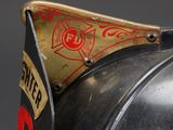 a close up of a fireman ' s helmet with the number 9 on it