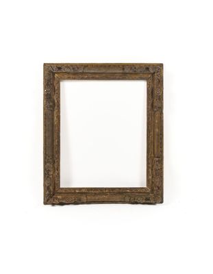 an old picture frame on a white wall with a white background