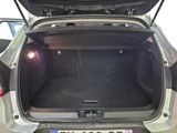 a trunk of a car with the back door open