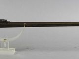 an image of a gun that is on a stand