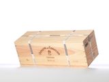 a wooden box with a bottle of wine inside of it