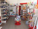 many shelves in the store with toys on them