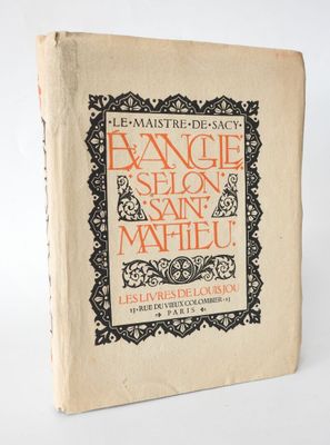 an old book with a black and orange design on it