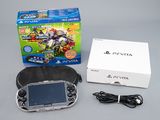 Console de jeux Nintendo Wii avec deux manettes et un coffret de jeux