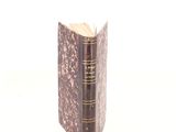 a book that is open on a white surface