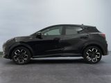 the black honda hrx is parked in a parking lot