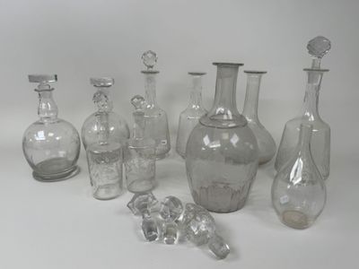 a lot of glass bottles that are sitting on a table