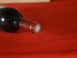 a bottle of wine that is sitting on a table