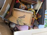 a cardboard box full of assorted items in it